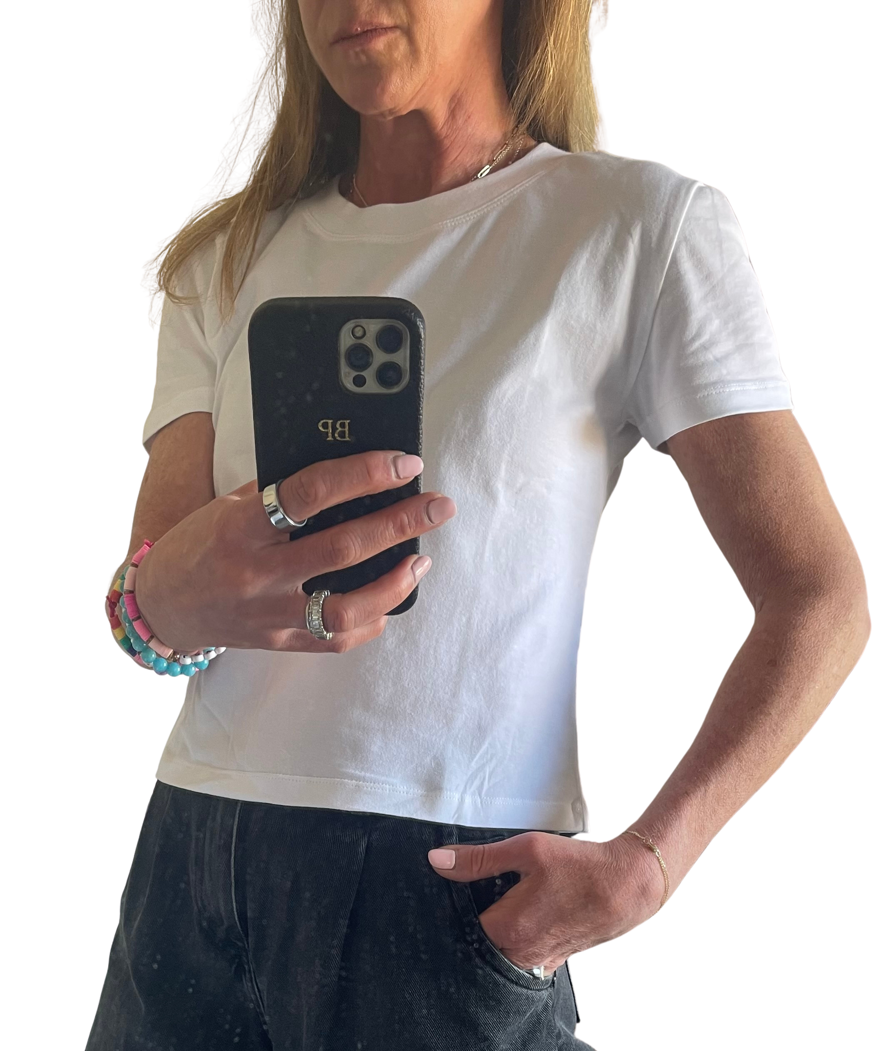 Woman wearing a white cotton t-shirt with black jeans